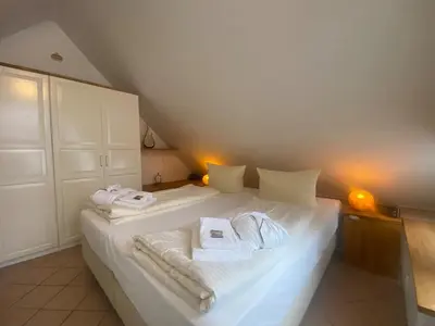 Ein Bett oder Betten in einem Zimmer der Unterkunft Luxus Ferienwohnung Traumblick Hahnenklee 4Sterne DTV