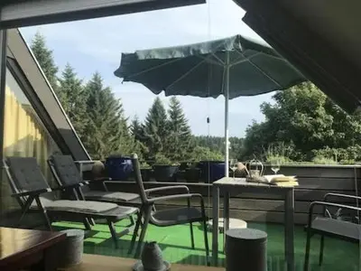 Ein Garten an der Unterkunft Luxus Ferienwohnung Traumblick Hahnenklee 4Sterne DTV