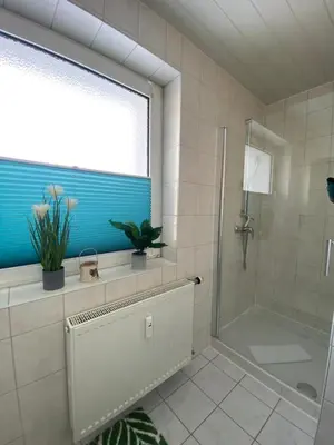 Ein Badezimmer in der Unterkunft FeWo Harzhörnchen mit Balkon