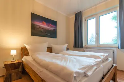 Ein Bett oder Betten in einem Zimmer der Unterkunft Naturpur Ferienhaus