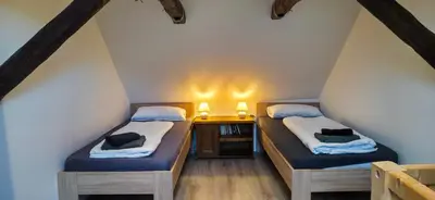 Ein Bett oder Betten in einem Zimmer der Unterkunft Exklusives Altstadthaus mit Schlossblick zentral in Wernigerode