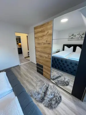 Ein Bett oder Betten in einem Zimmer der Unterkunft HarzRoots A mit Garage