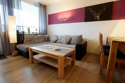 Ein Sitzbereich in der Unterkunft Ferienwohnung Relax 6