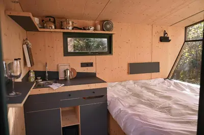 Ein Bett oder Betten in einem Zimmer der Unterkunft Sleep Space 1 - Green&Tiny Spot Osterwieck Birkenmühle