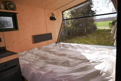 Ein Bett oder Betten in einem Zimmer der Unterkunft Sleep Space 1 - Green&Tiny Spot Osterwieck Birkenmühle