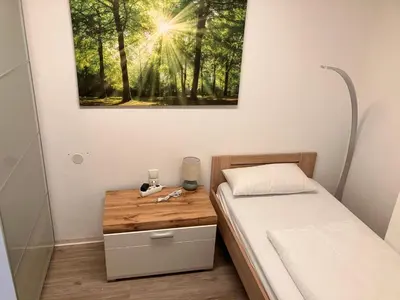 Ein Bett oder Betten in einem Zimmer der Unterkunft 