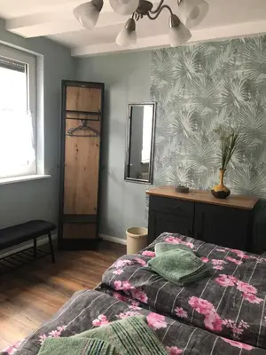 Ein Bett oder Betten in einem Zimmer der Unterkunft FeWo M Becker