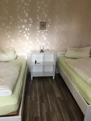 Ein Bett oder Betten in einem Zimmer der Unterkunft FeWo M Becker