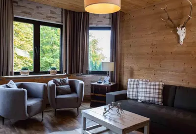 Ein Sitzbereich in der Unterkunft StrandBerg's Harzchalet