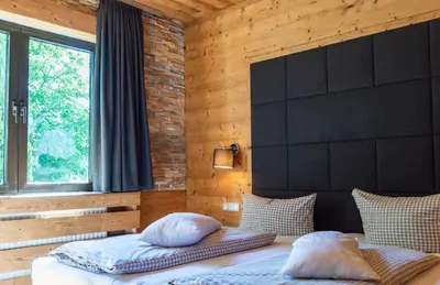 Ein Bett oder Betten in einem Zimmer der Unterkunft StrandBerg's Harzchalet
