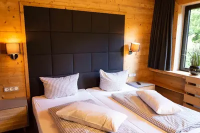 Ein Bett oder Betten in einem Zimmer der Unterkunft StrandBerg's Harzchalet