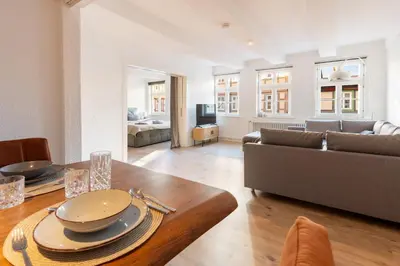 Ein Sitzbereich in der Unterkunft Ferienwohnung am Nicolaiplatz