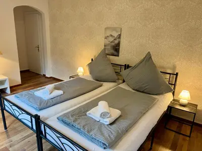 Ein Bett oder Betten in einem Zimmer der Unterkunft FichtenNest Altenau - für 4 Personen und Haustier!