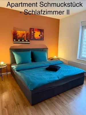 Ein Bett oder Betten in einem Zimmer der Unterkunft Westerhäuser Ferienwohungen