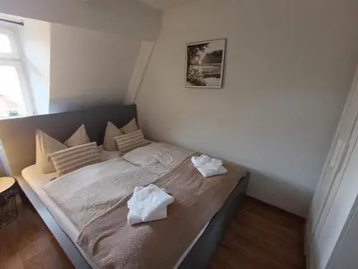 Ein Bett oder Betten in einem Zimmer der Unterkunft Kleine Auszeit Quedlinburg