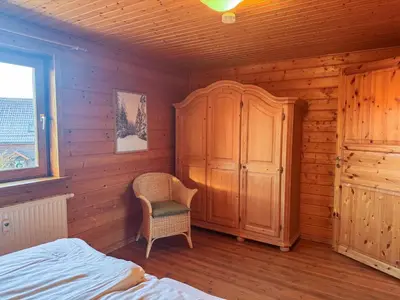 Ein Bett oder Betten in einem Zimmer der Unterkunft Feriendorf Blauvogel BV 33