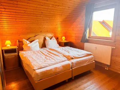 Ein Bett oder Betten in einem Zimmer der Unterkunft Feriendorf Blauvogel BV 33