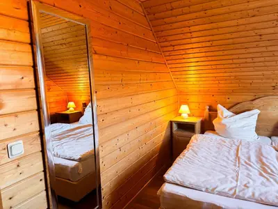 Ein Bett oder Betten in einem Zimmer der Unterkunft Feriendorf Blauvogel BV 33
