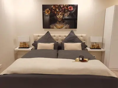 Ein Bett oder Betten in einem Zimmer der Unterkunft CM Harz-Appartement