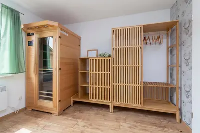 Ein Bett oder Betten in einem Zimmer der Unterkunft FH HarzHirsch - Kamin, Sauna, Bettwäsche, Kurtaxe inklusive