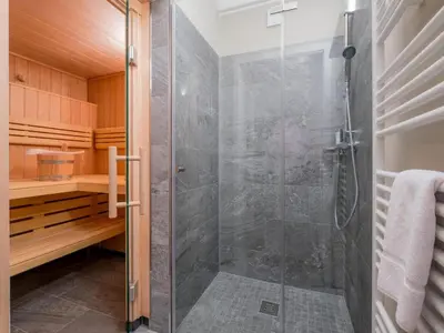 Ein Badezimmer in der Unterkunft Ferienhäuser, Torfhaus