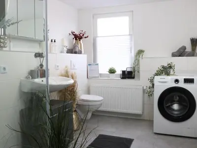 Ein Badezimmer in der Unterkunft Heimat Goslar Apartments 