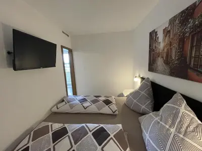 Ein Bett oder Betten in einem Zimmer der Unterkunft Auszeit 376 Sauna/Hallenbad
