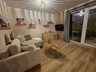 TV/Unterhaltungsangebot in der Unterkunft Ferienwohnung am Wald mit Garten