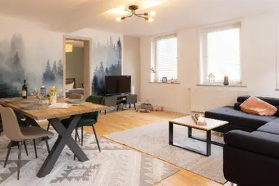 Ein Sitzbereich in der Unterkunft Harter Brocken Tatort Apartment 2 Einheiten