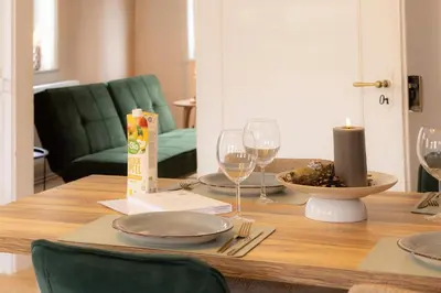 Ein Sitzbereich in der Unterkunft Harter Brocken Tatort Apartment 2 Einheiten