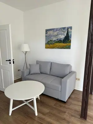Ein Sitzbereich in der Unterkunft Ferienwohnung Mauerperle