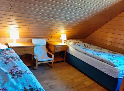 Ein Bett oder Betten in einem Zimmer der Unterkunft Feriendorf Blauvogel BV 56
