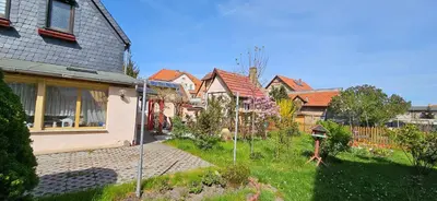 Ein Garten an der Unterkunft Ferienhaus Rosengarten