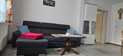Ein Sitzbereich in der Unterkunft Ferienhaus Rosengarten