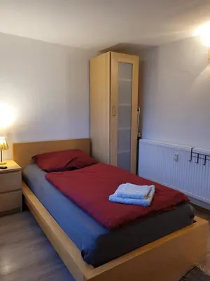 Ein Bett oder Betten in einem Zimmer der Unterkunft Fewo Langenstein
