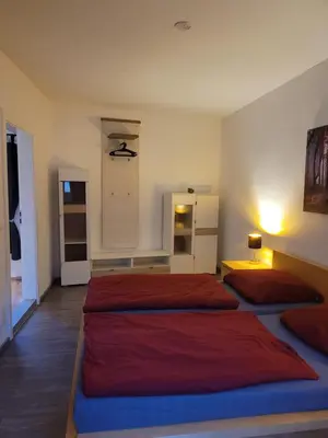 Ein Bett oder Betten in einem Zimmer der Unterkunft Fewo Langenstein