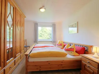 Ein Bett oder Betten in einem Zimmer der Unterkunft Chaffinch in the Tanneneck house