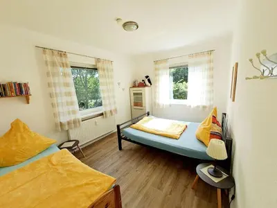 Ein Bett oder Betten in einem Zimmer der Unterkunft Chaffinch in the Tanneneck house