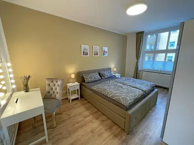 Ein Bett oder Betten in einem Zimmer der Unterkunft Gästewohnung 