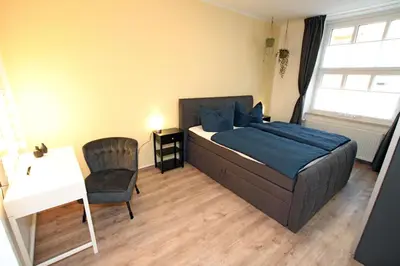Ein Bett oder Betten in einem Zimmer der Unterkunft Gästewohnung 
