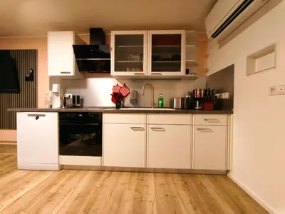 Küche/Küchenzeile in der Unterkunft Komfortabler Bungalow Am Schlosswald mit privater Sauna&Terrasse - Wernigerode Harz