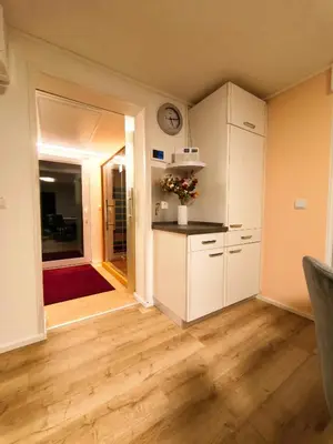 Küche/Küchenzeile in der Unterkunft Komfortabler Bungalow Am Schlosswald mit privater Sauna&Terrasse - Wernigerode Harz