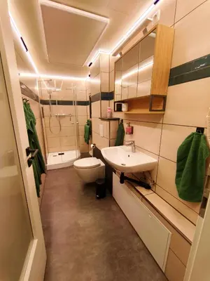 Ein Badezimmer in der Unterkunft Komfortabler Bungalow Am Schlosswald mit privater Sauna&Terrasse - Wernigerode Harz