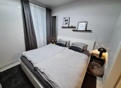 Ein Bett oder Betten in einem Zimmer der Unterkunft NEU Ferienwohnung Bella, eigener Garten, stylisch, elegant, hundefreundlich