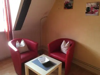 Ein Sitzbereich in der Unterkunft Apartment Wohnung in Wernigerode mit Garten by Interhome