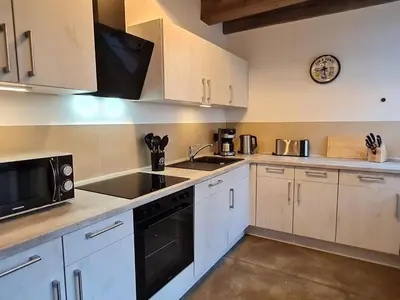 Küche/Küchenzeile in der Unterkunft Apartment Ferienappartement 3 im Speicherwerk by Interhome