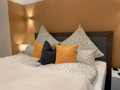 Ein Bett oder Betten in einem Zimmer der Unterkunft Apartment Ferienwohnung mit Boxspringbett by Interhome