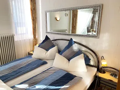 Ein Bett oder Betten in einem Zimmer der Unterkunft Apartment Fewo für 2 Personen mit Wintergarten by Interhome
