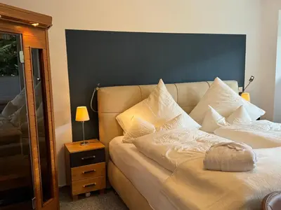 Ein Bett oder Betten in einem Zimmer der Unterkunft Apartment Ferienwohnung mit Infrarotwärmekabine by Interhome