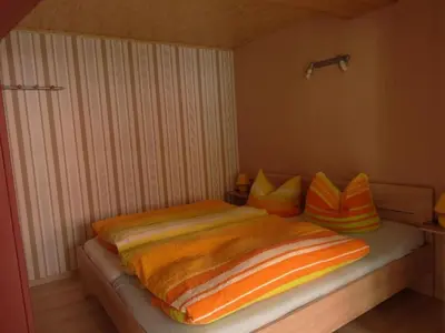 Ein Bett oder Betten in einem Zimmer der Unterkunft Apartment Gästehaus Tröbs by Interhome